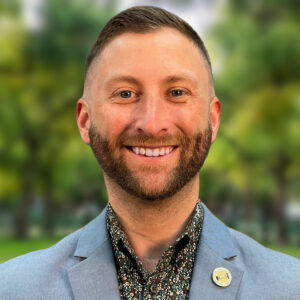 Icon for Nick Zoller, Director of Strategic Communications (<a href=